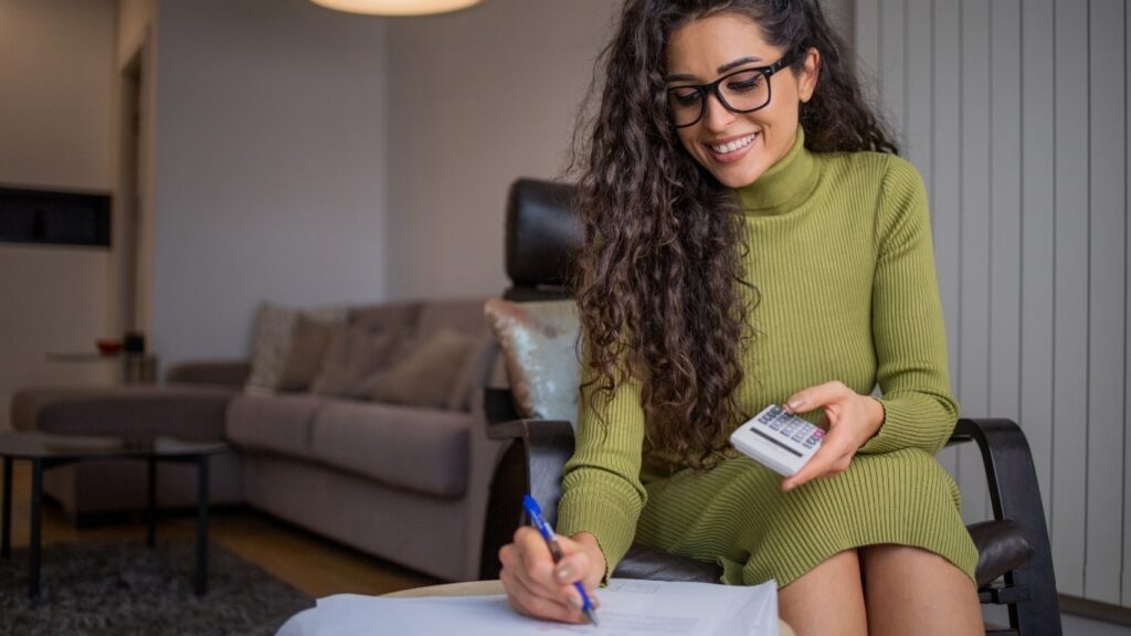 Ptin Application — signing a document at home
